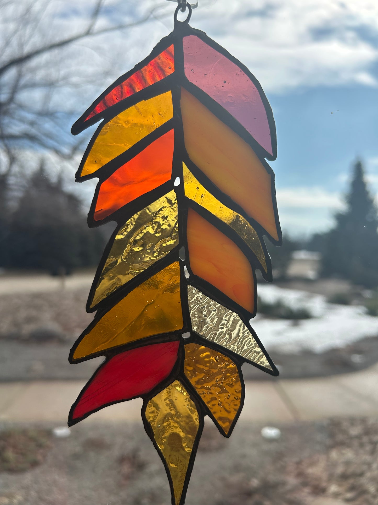 Handcrafted Stained Glass Feather – Warm Amber & Sunset Tone Sun Catcher